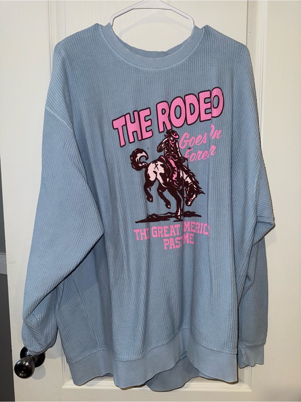 Corduroy Oversized Sweatshirt with Pink Rodeo Graphic - Light Blue